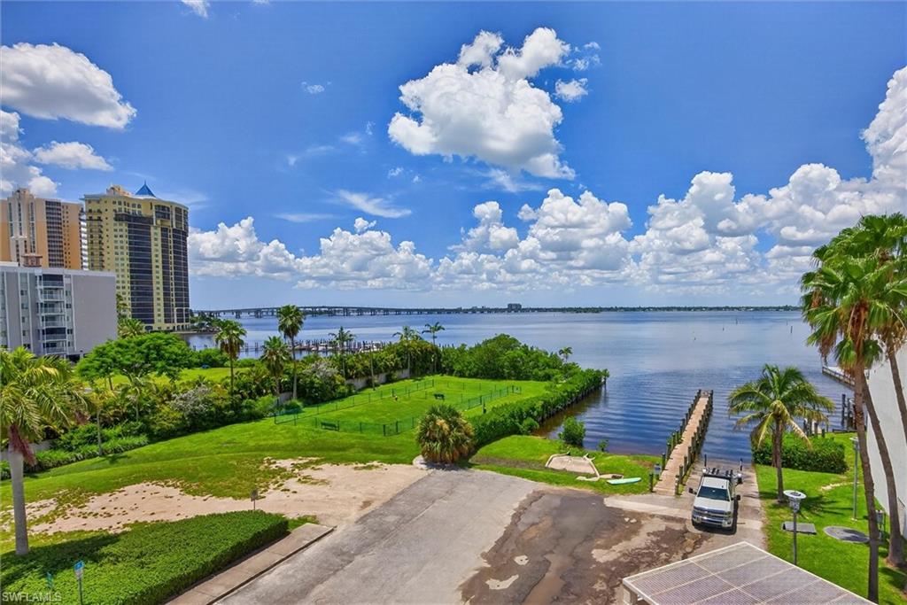 Waterfront expanse featuring a boat launch and pier