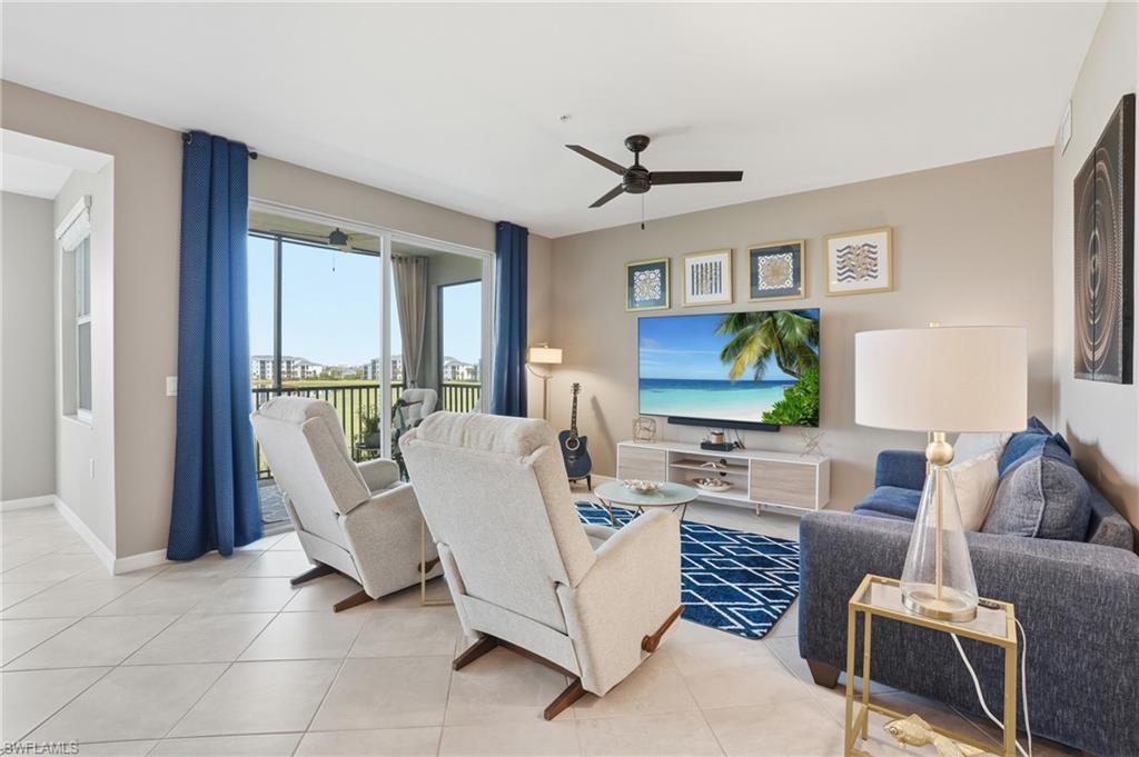 Tile flooring throughout, recessed lighting, and a ceiling fan with light fixture