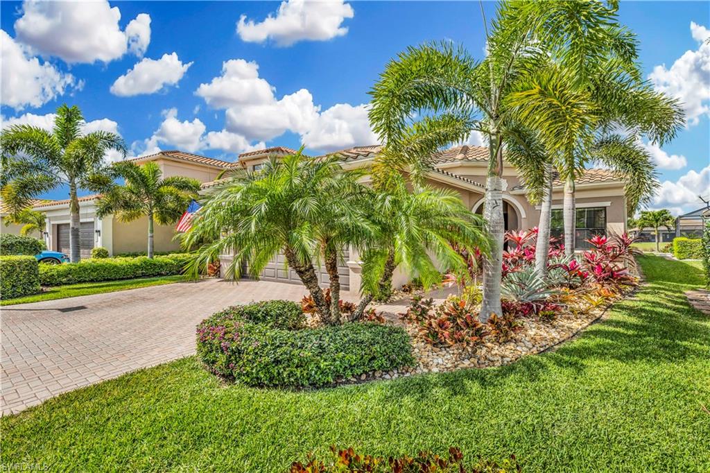 Stunning curb appeal with upgraded landscaping.