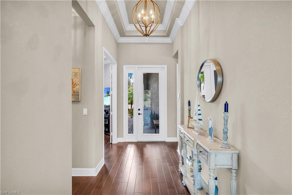 Open foyer entry with soaring ceiling, and hardwood floors throughout.