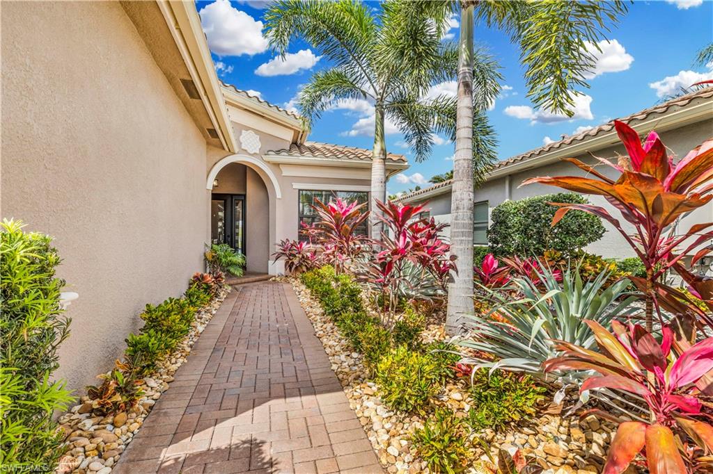 Stunning entry with upgraded landscaping.