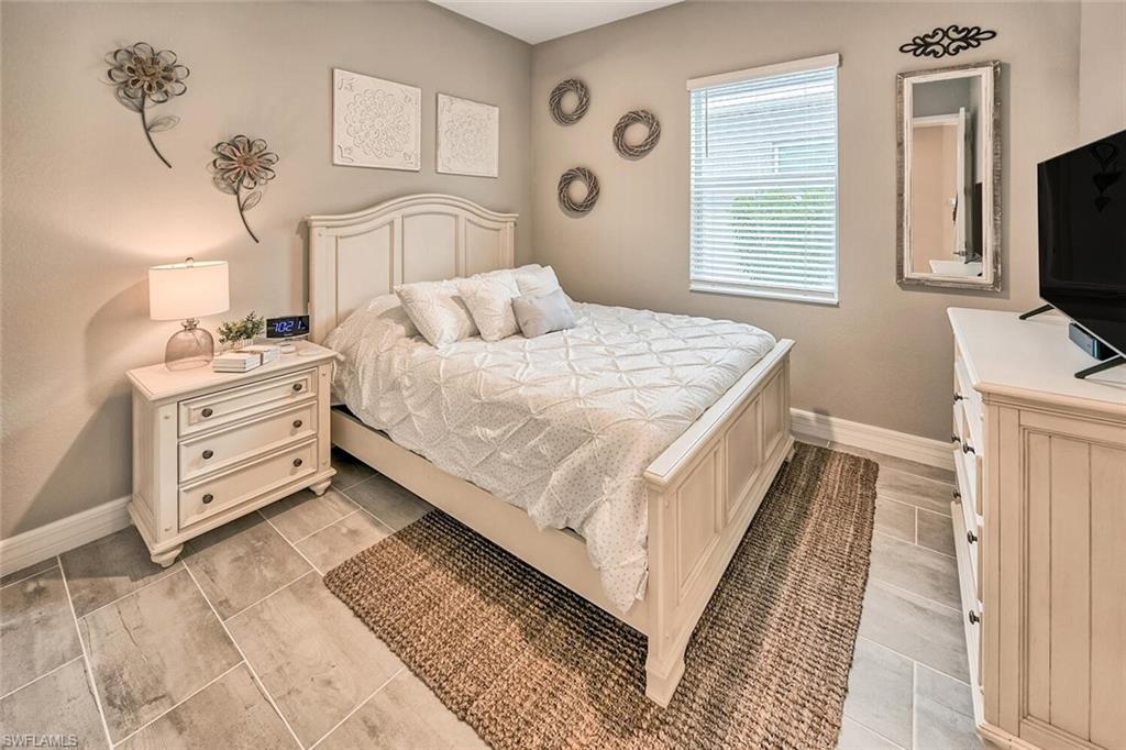 Bedroom with baseboards