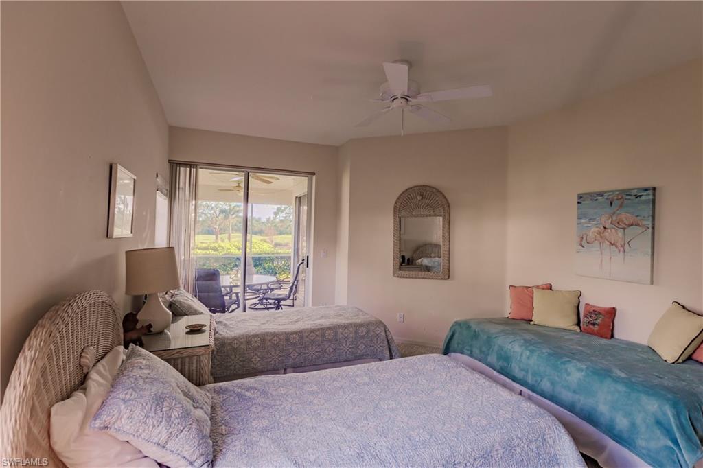 Bedroom featuring access to exterior and ceiling fan