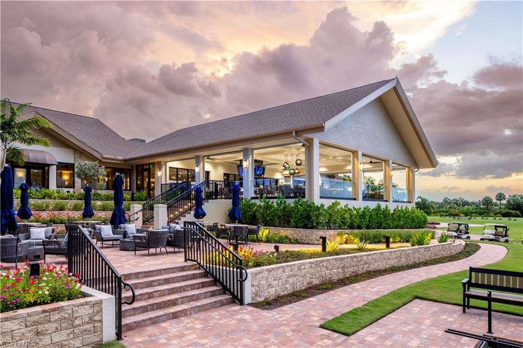 View of community with a patio and an outdoor living space