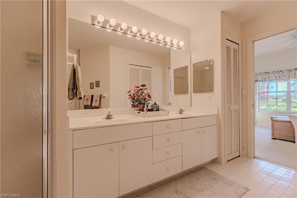Bathroom featuring vanity and tile patterned floors