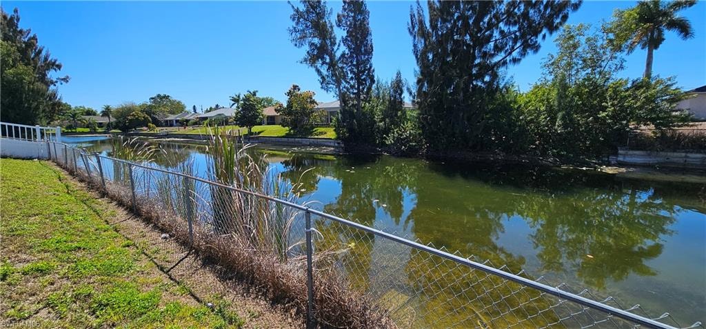 Water view featuring nearby suburban area