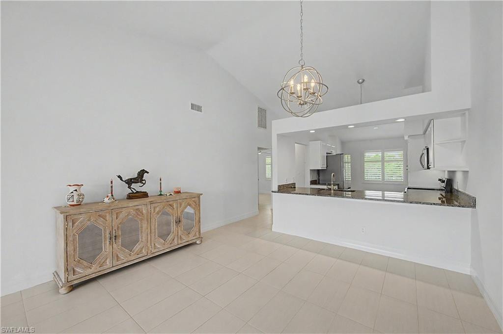 View Toward Front Entrance & Kitchen