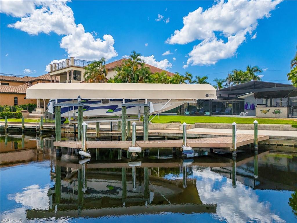 Covered 20,000 pound Boat Lift w/private dock