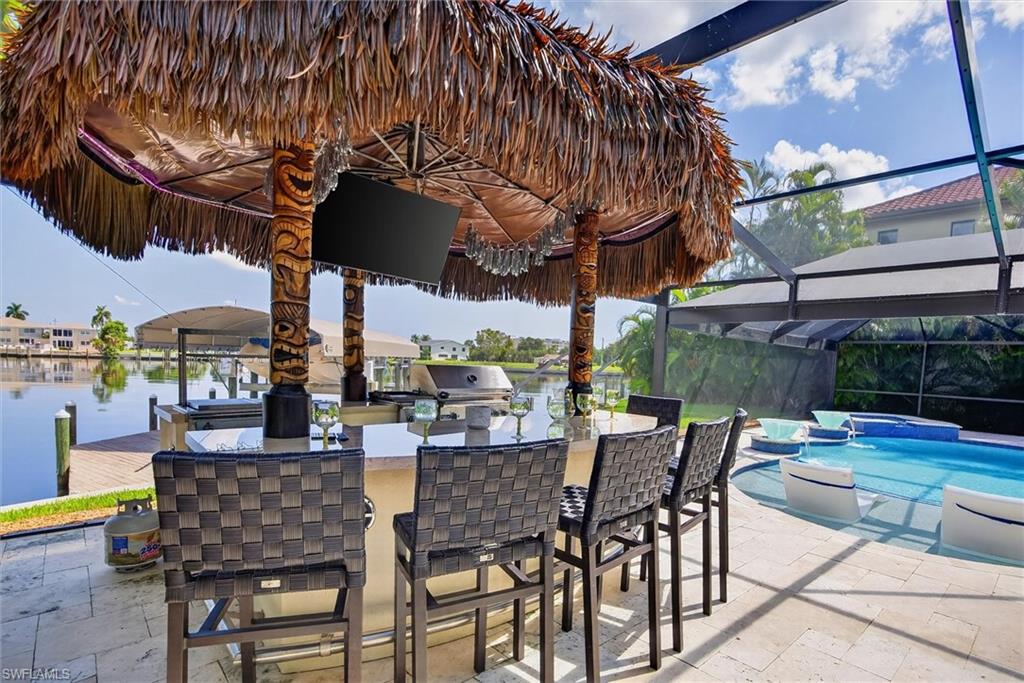 Full Tiki Bar on pool deck, under covered lanai