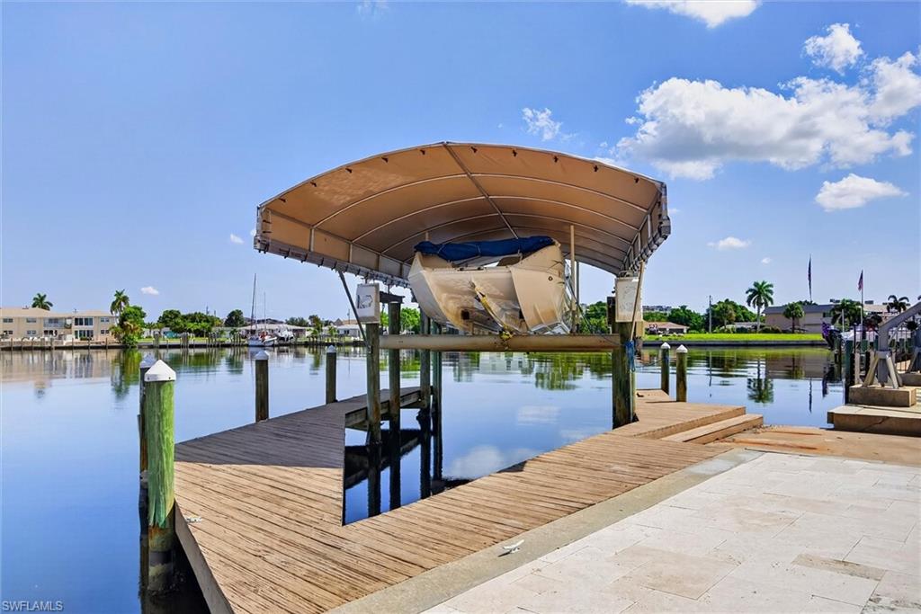 Covered 20,000 pound Boat lift w/private dock