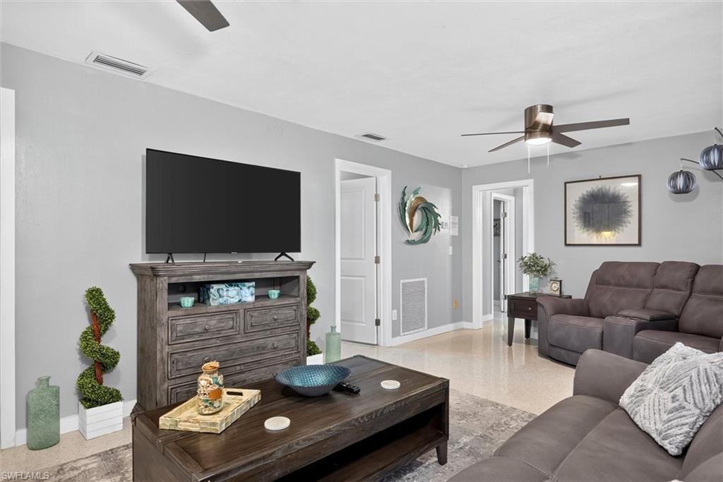 Thoughtfully designed split floor plan places 2 King bedrooms, one w/ensuite bath, and a third bathroom w/access to the pool.