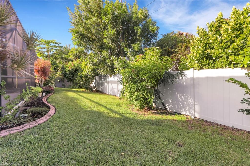View of fenced backyard