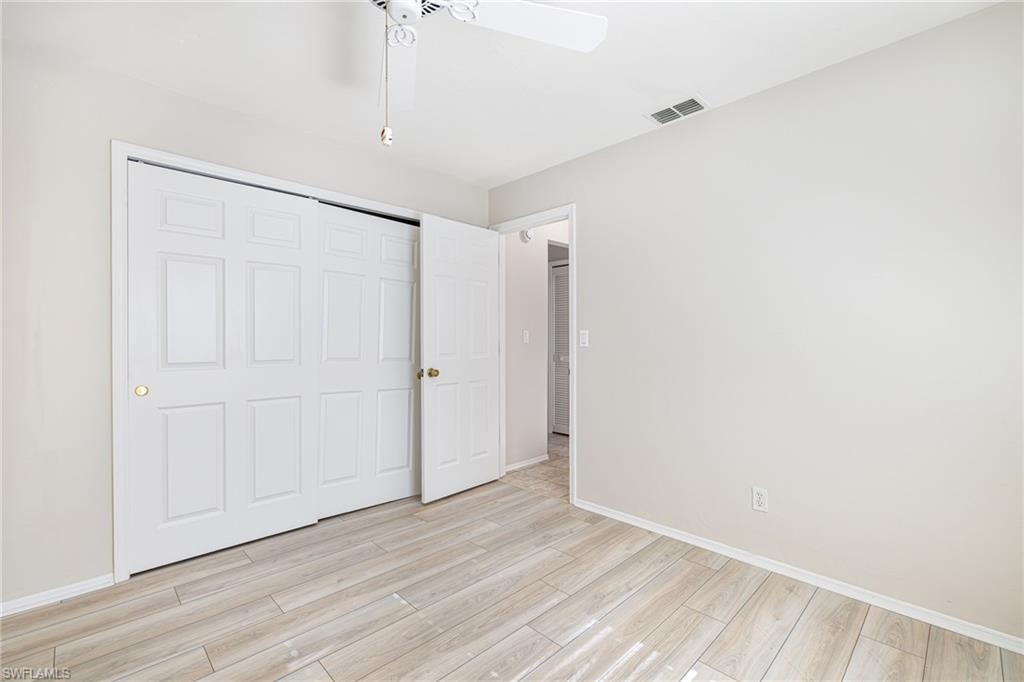 Light-toned walls complement wood-finish flooring