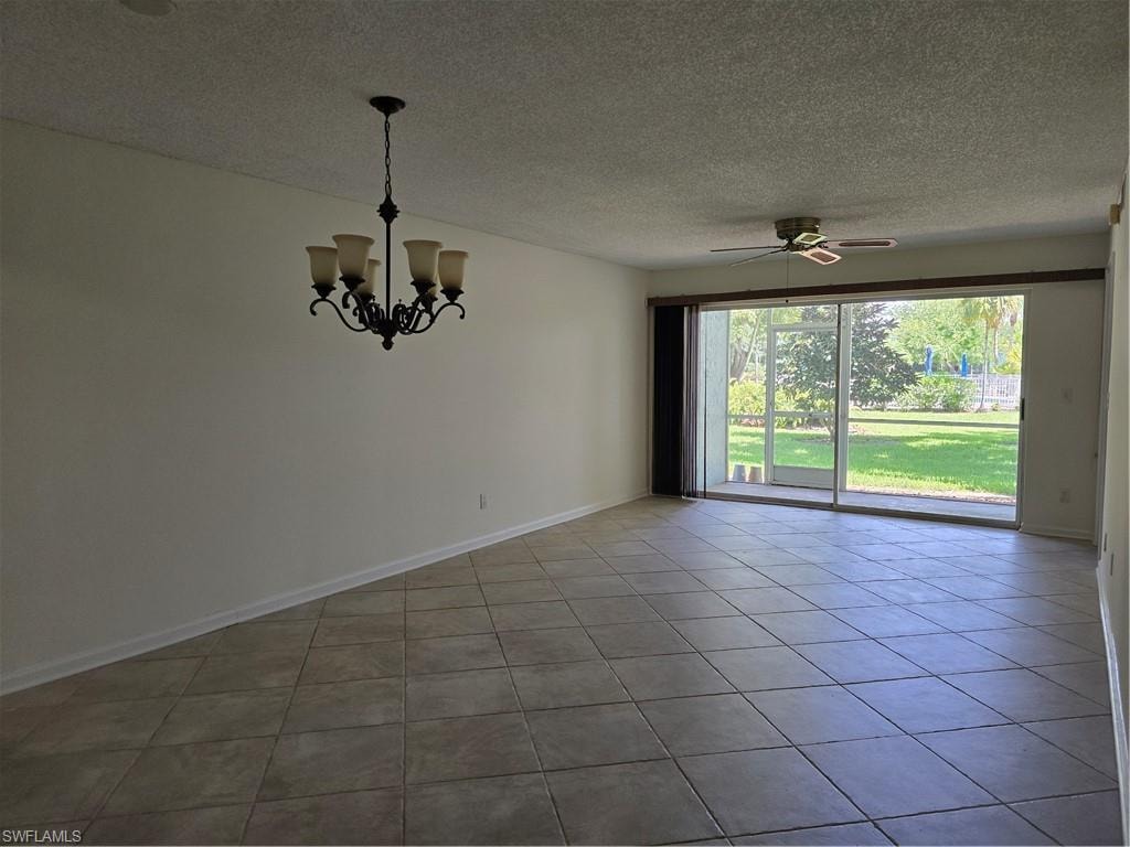 Living area with chandelier and ceiling fan