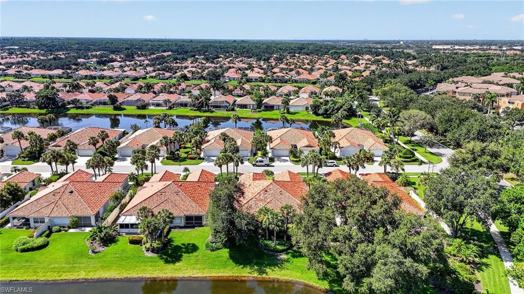 Mature landscaping makes this lanai very private and picturesque