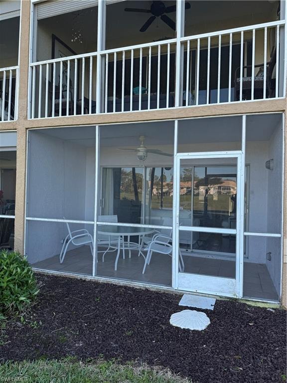 Screened-in patio with tiled flooring