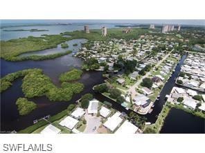 Bird's eye view as a boater leaving the canal system of Spring Creek Village and heading toward Estero Bay and Gulf of Mexico.