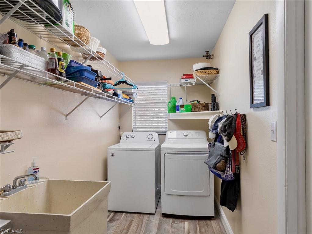 Laundry room with tub