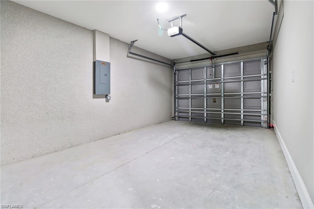 Garage featuring electric panel