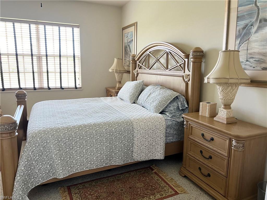 Bedroom with carpet