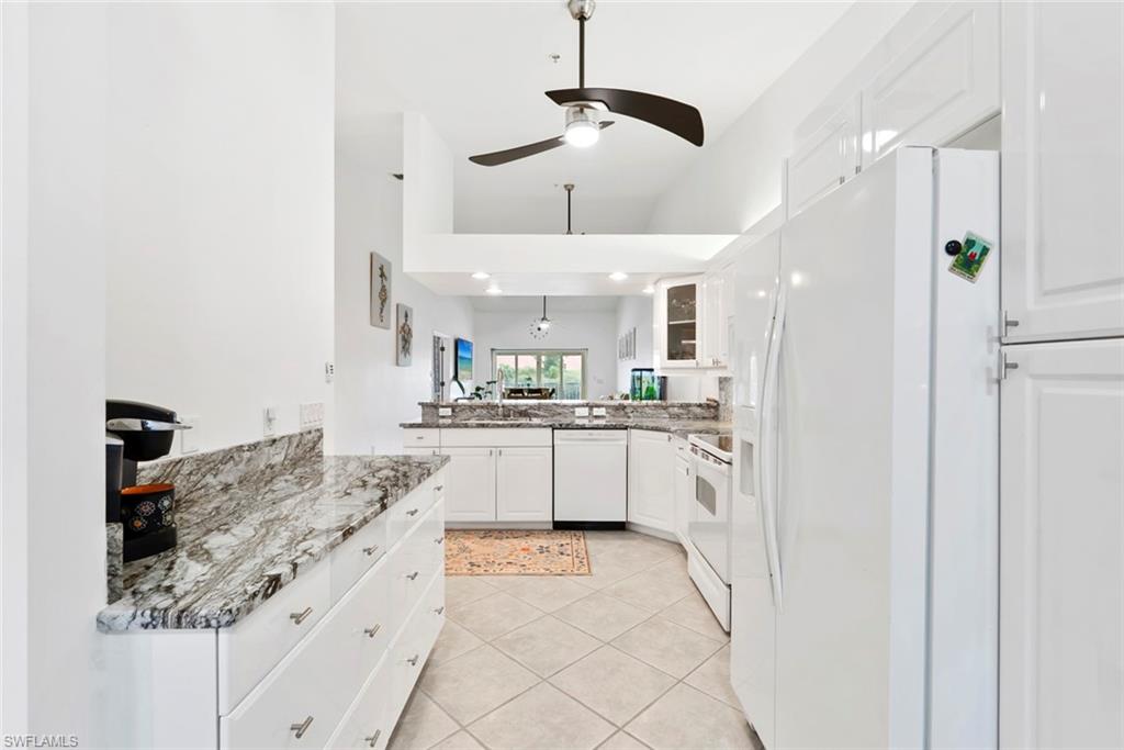 Bright white kitchen, new sink and faucets