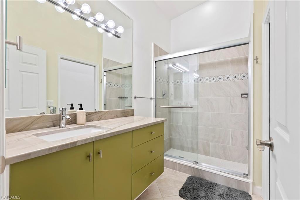 Updated bathroom with new vanity and shower features