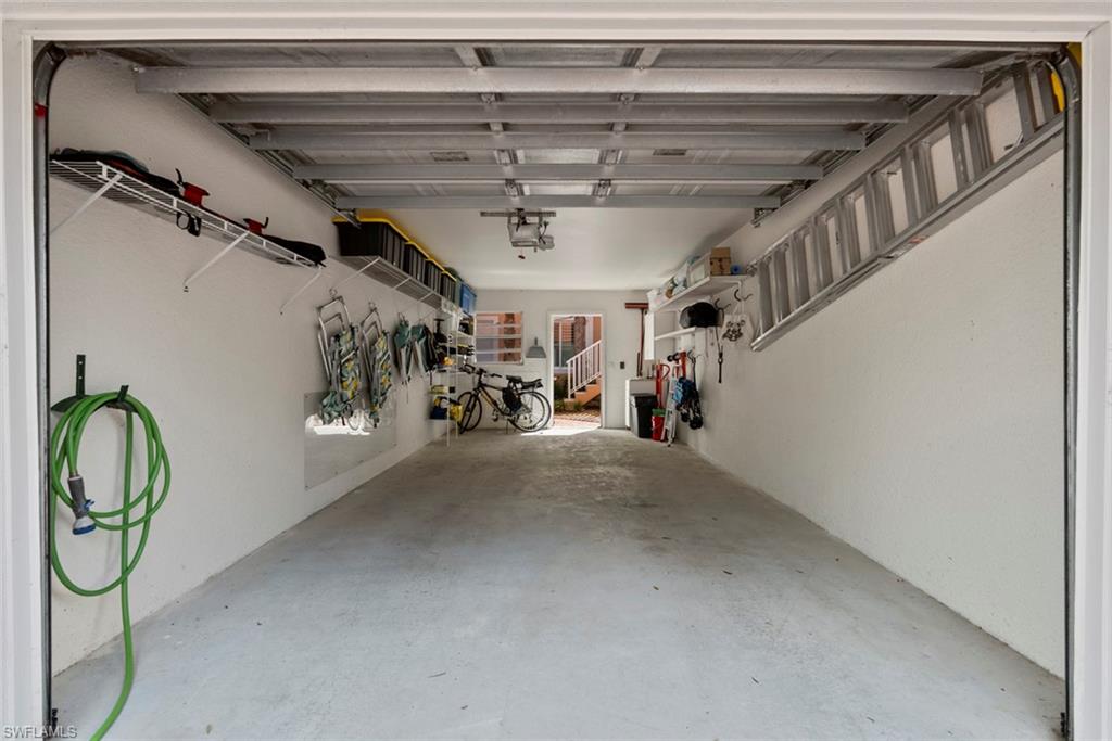 1-car detached garage fit with shelving and hooks perfect for all your gear