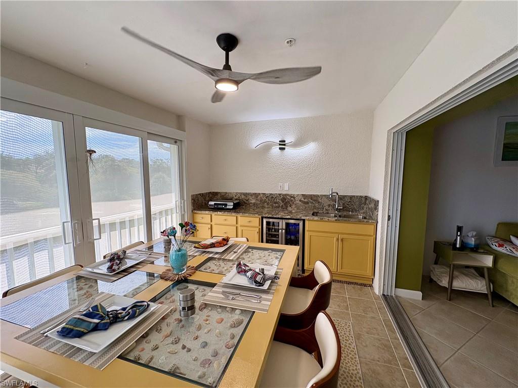 Great for entertaining, lanai has sun shades.