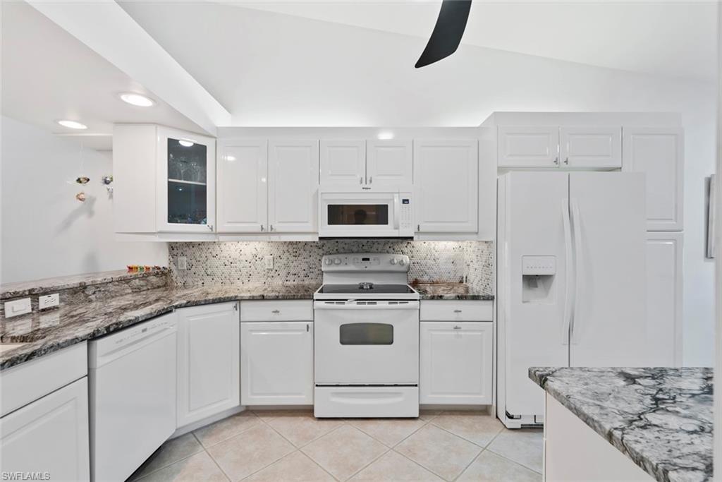 Newly installed backsplash, new dishwasher