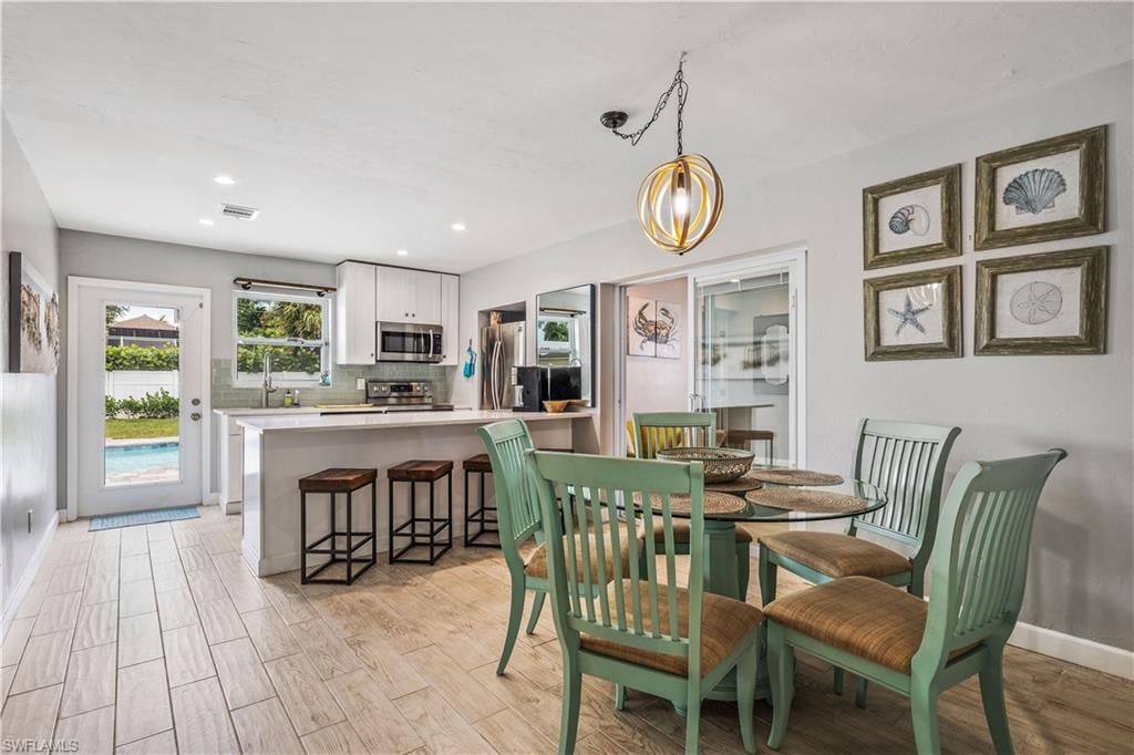 Dining room with light wood-type flooring