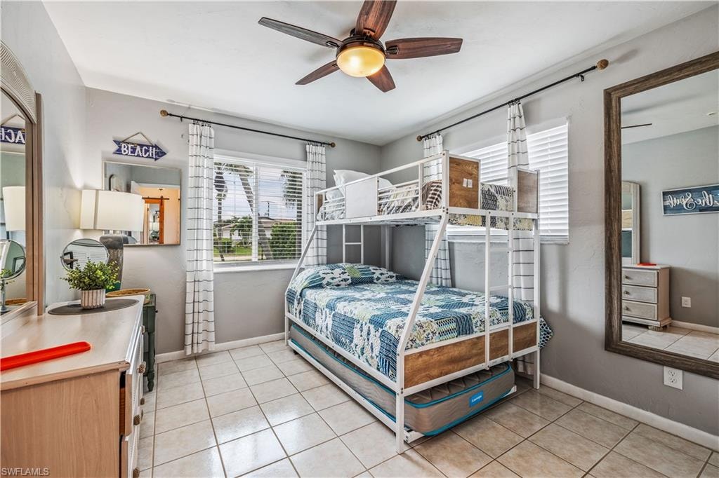 Bedroom featuring ceiling fan and light tile patterned floors