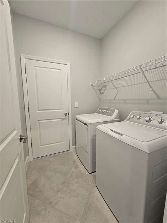 Light gray tiled flooring, white wire shelving, and two white doors with silver-tone hardware