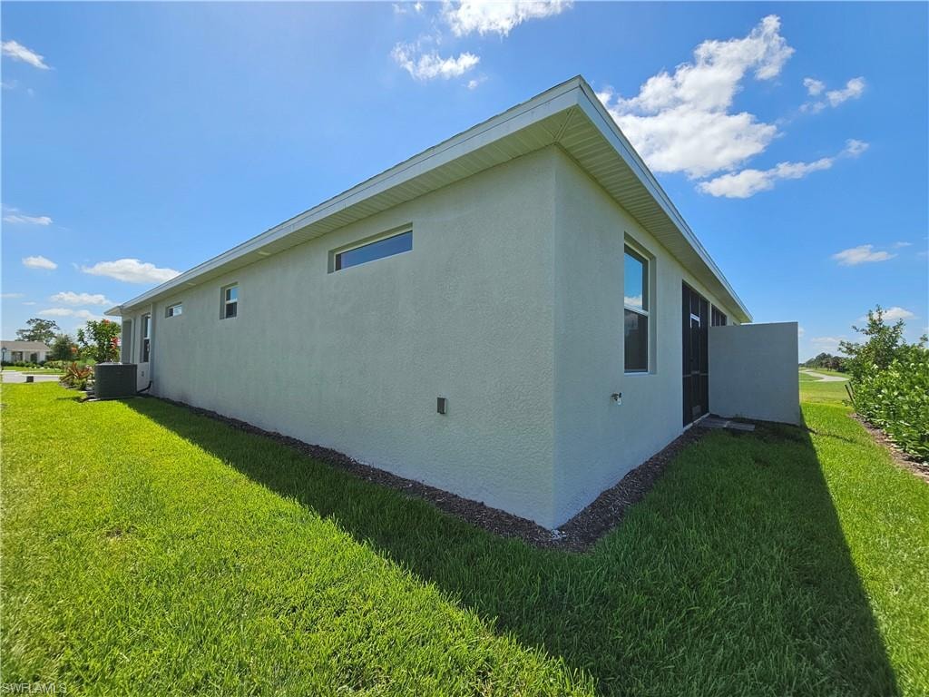 Stucco exterior with a white trim roofline