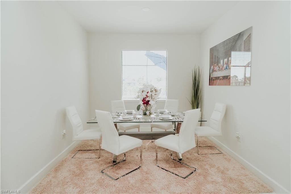 Dining area featuring baseboards