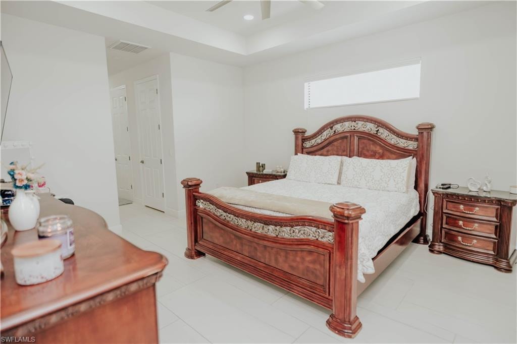 Bedroom featuring visible vents, a ceiling fan, and recessed lighting