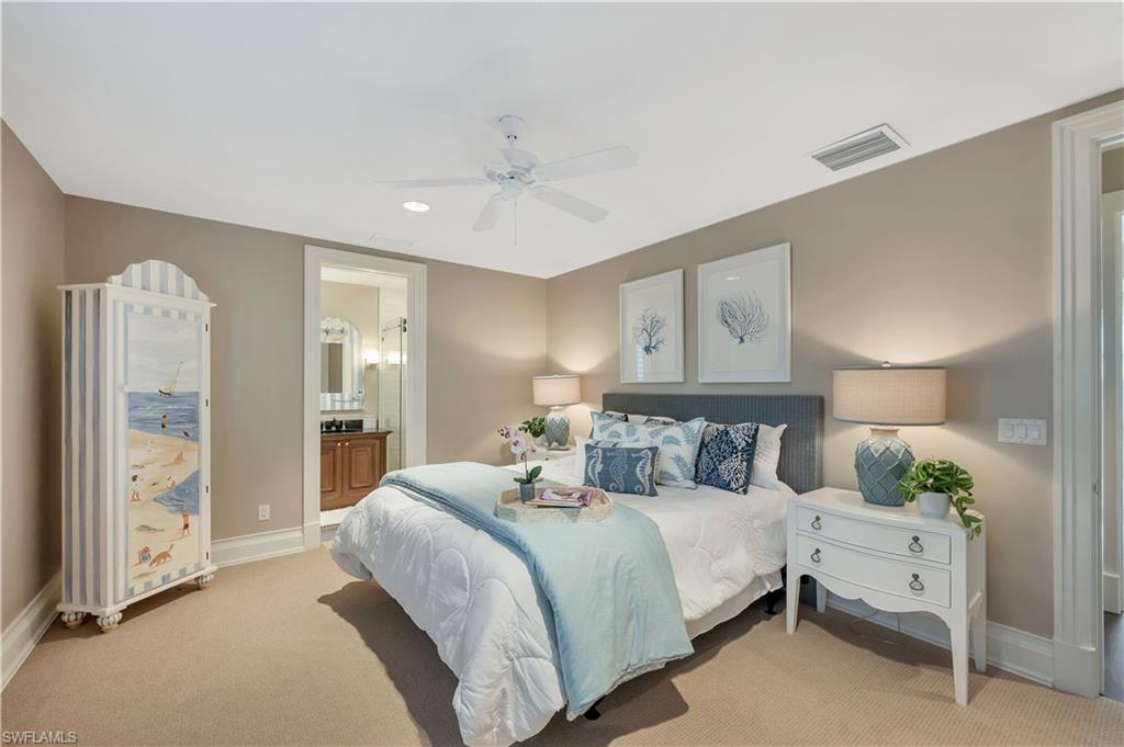 Carpeted flooring, recessed lighting, ceiling fan, and painted walls