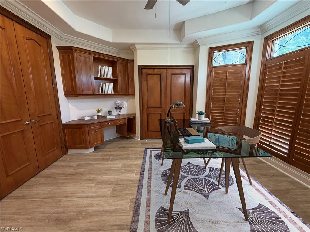 Built-in wood cabinetry with integrated desk
