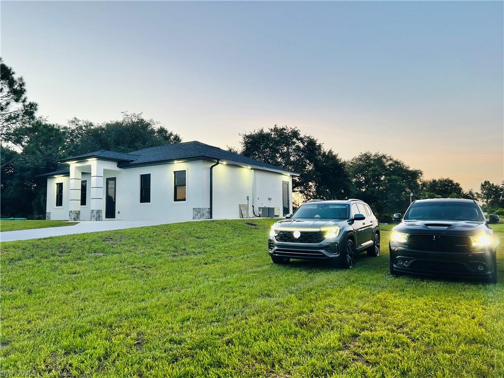 lots of extra parking to the right of the property