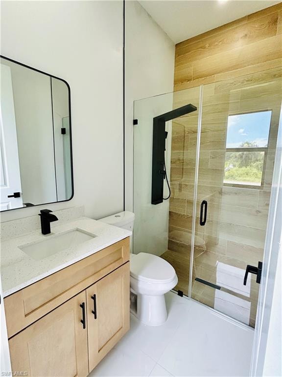 Light-toned wood vanity with a white countertop and rectangular sink