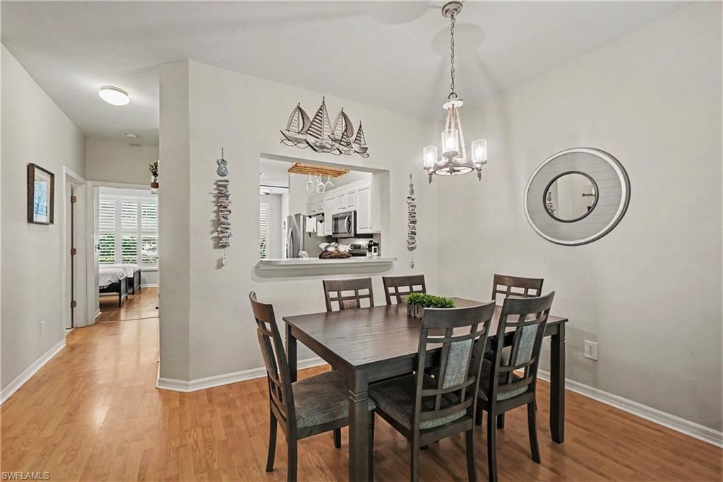 Dining room looking toward kitchen and den