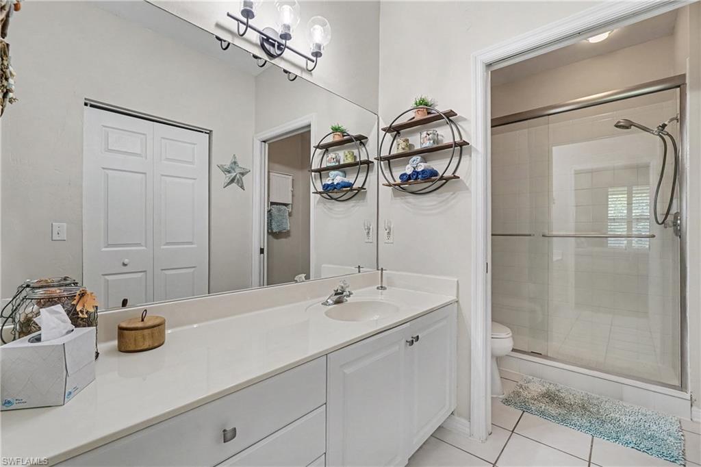 Primary ensuite bath with walk-in closet