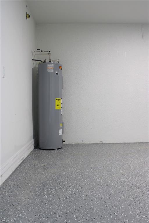 Epoxy flake flooring, water heater, and painted walls