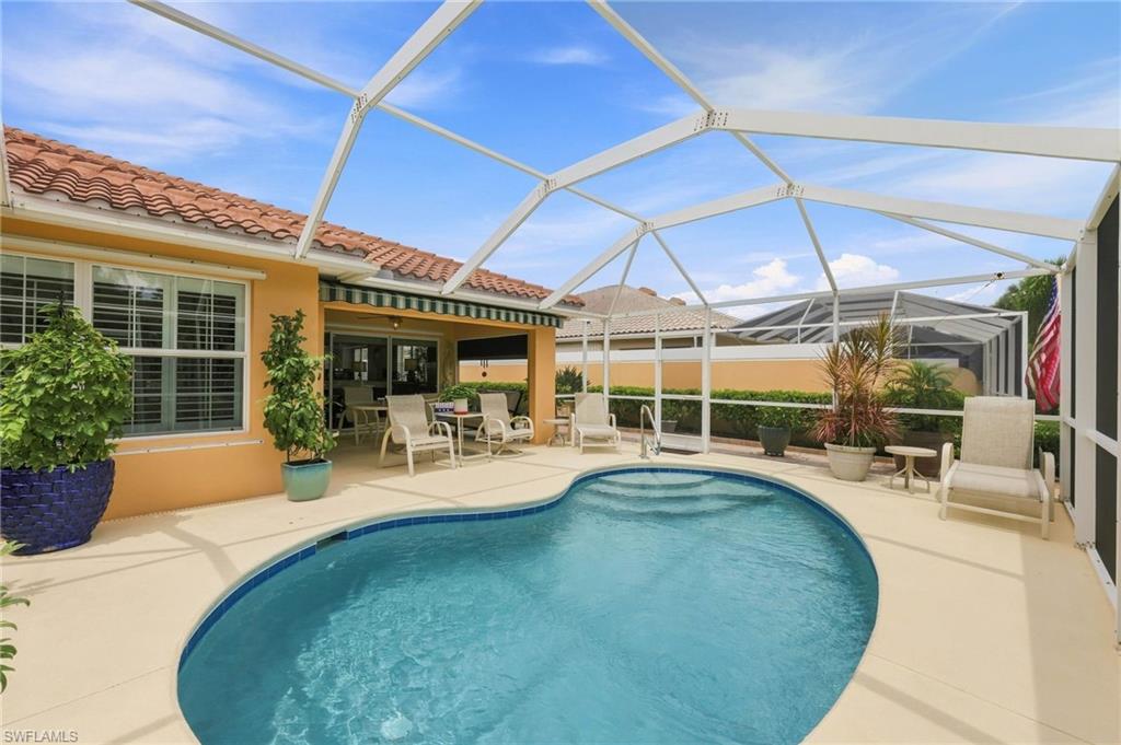 Heated Pool with screen enclosure and large patio area
