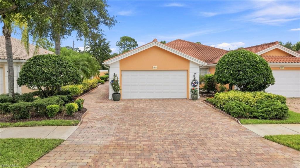 Front garage entry with extended driveway pavers
