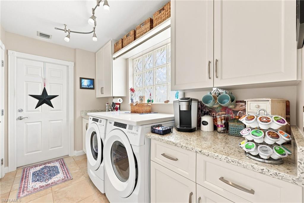 Updated laundry room with newer washer and dryer
