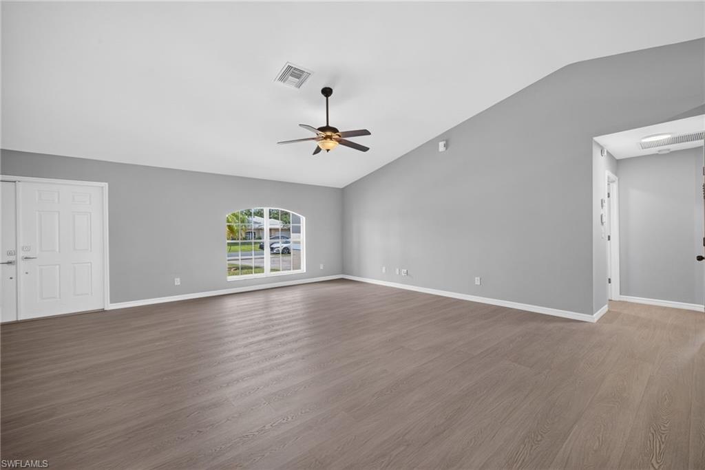 Living room facing master bedroom and front door