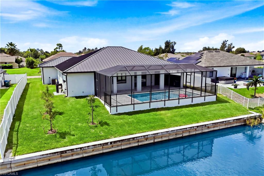 WAKE UP TO WATERFRONT VIEWS & embrace the SWFL LIFESTYLE—morning coffee by the canal, afternoons kayaking or paddleboarding & evenings relaxing poolside in your own backyard paradise!