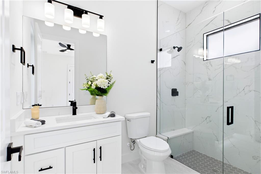 Convenient POOL BATH ACCESS makes indoor-outdoor living effortless for guests & poolside days!