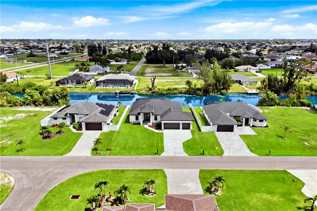 ENJOY the ultimate SWFL WATERFRONT LIFESTYLE w/ serene FRESHWATER CANAL VIEWS, direct backyard water access & the perfect setting to enjoy Florida living!