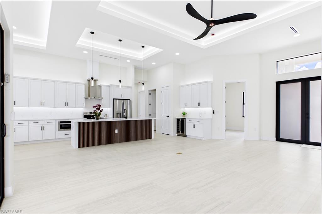 Bright, open layout w/ LIGHT NEUTRAL TILE FLOORING.